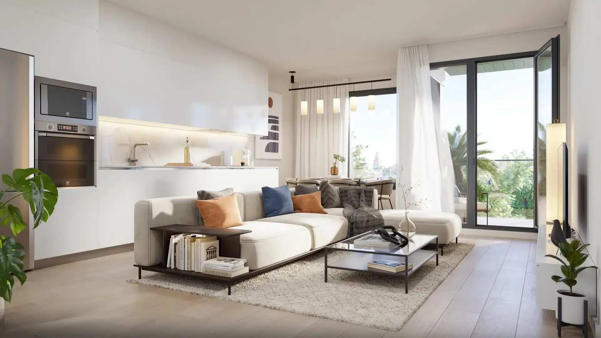 Modern living room with a white sectional sofa, colorful throw pillows, glass coffee table, and sliding glass doors leading to a balcony with greenery outside.