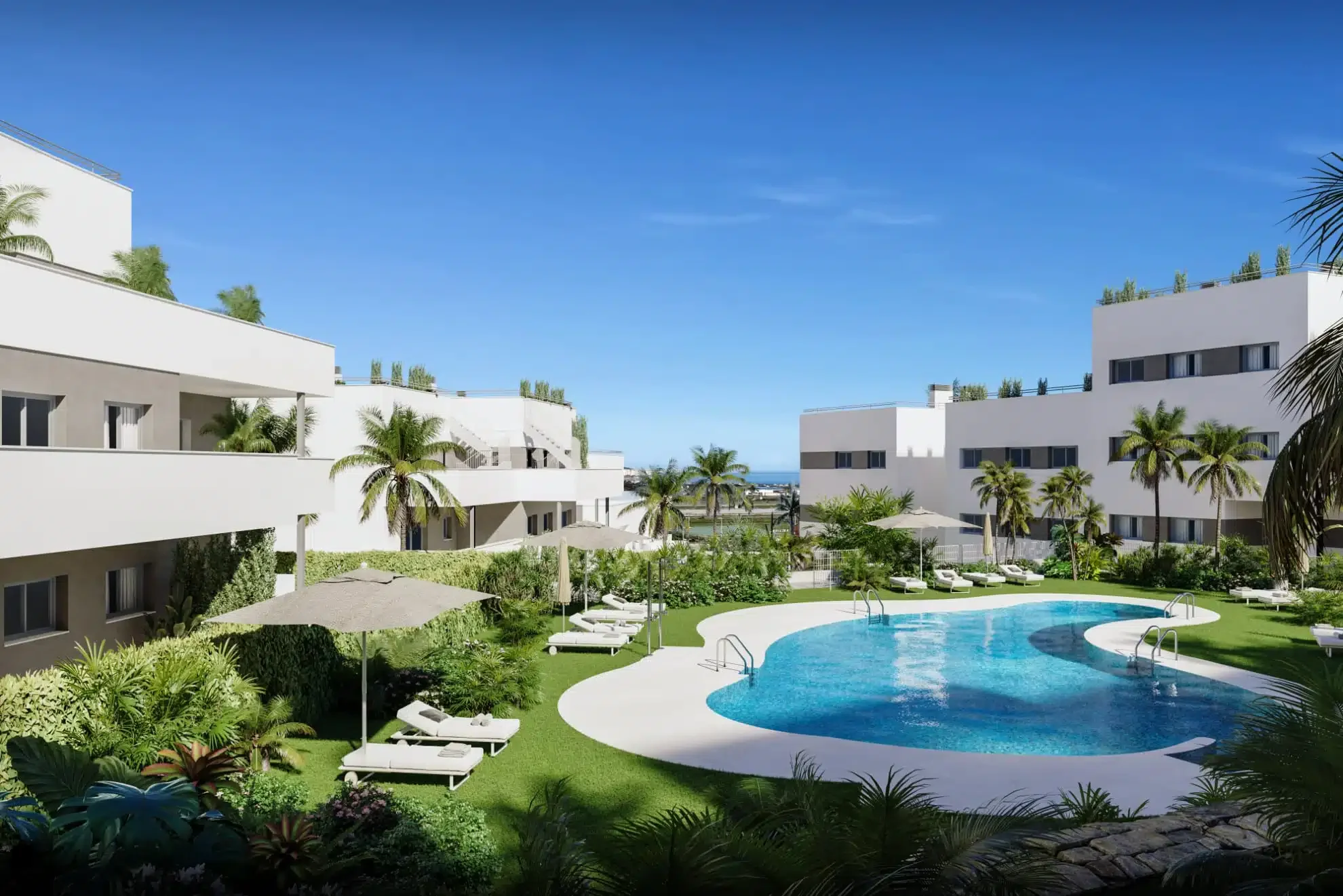 A swimming pool in a modern hotel courtyard with surrounding lounge chairs, umbrellas, palm trees, and white residential buildings under a blue sky.
