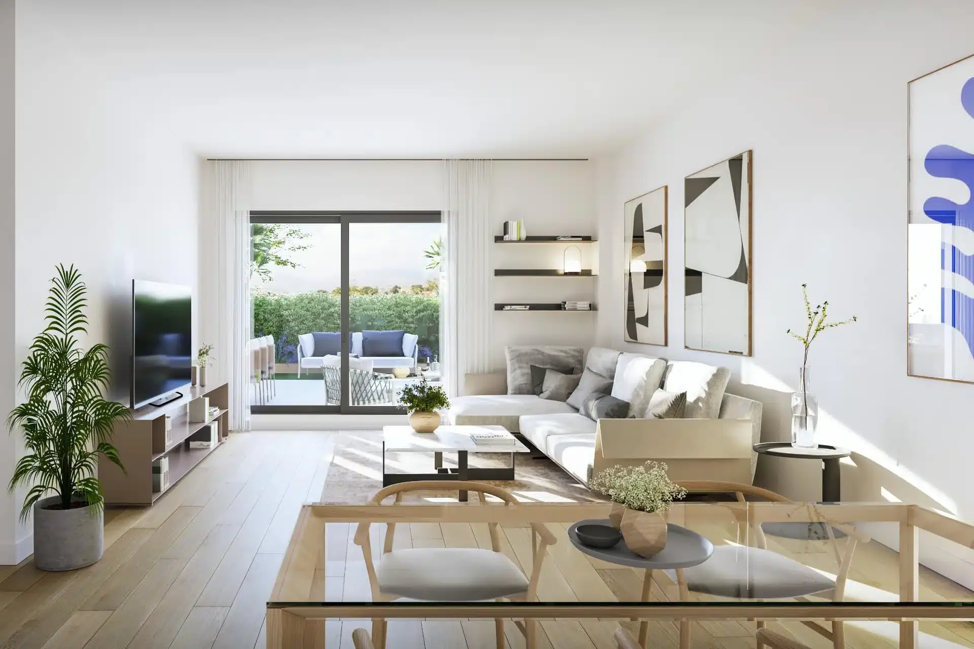 Modern living room with a white sofa, wall art, a coffee table, and a large sliding glass door leading to an outdoor patio.