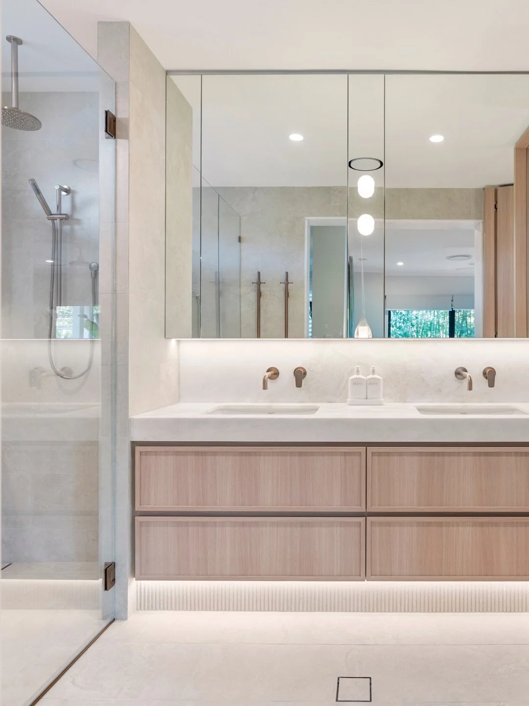 A renovation can have the finest tiles, the most considered joinery, the best fixtures money can buy... and still fall flat without the glazing to finish it.

This Yowie Bay bathroom is proof of what happens when the glass is treated as a design deci