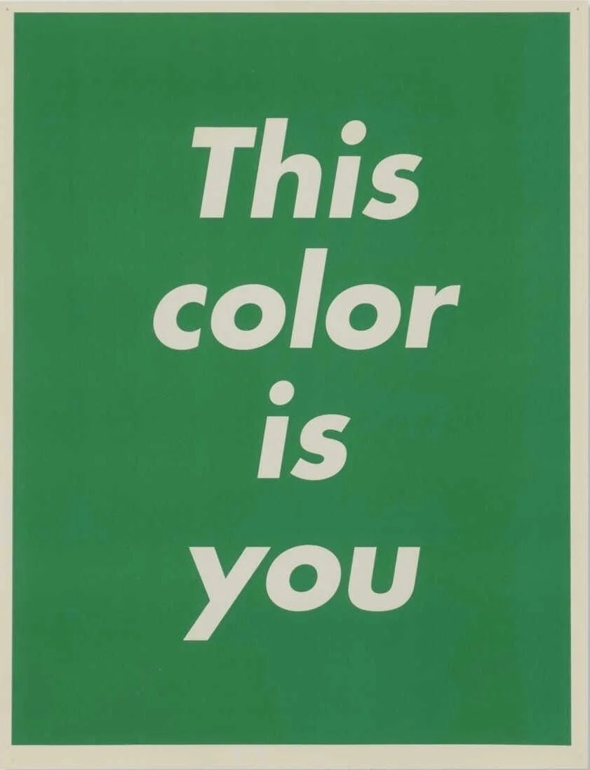 A green sign with white text that reads, "This color is you."