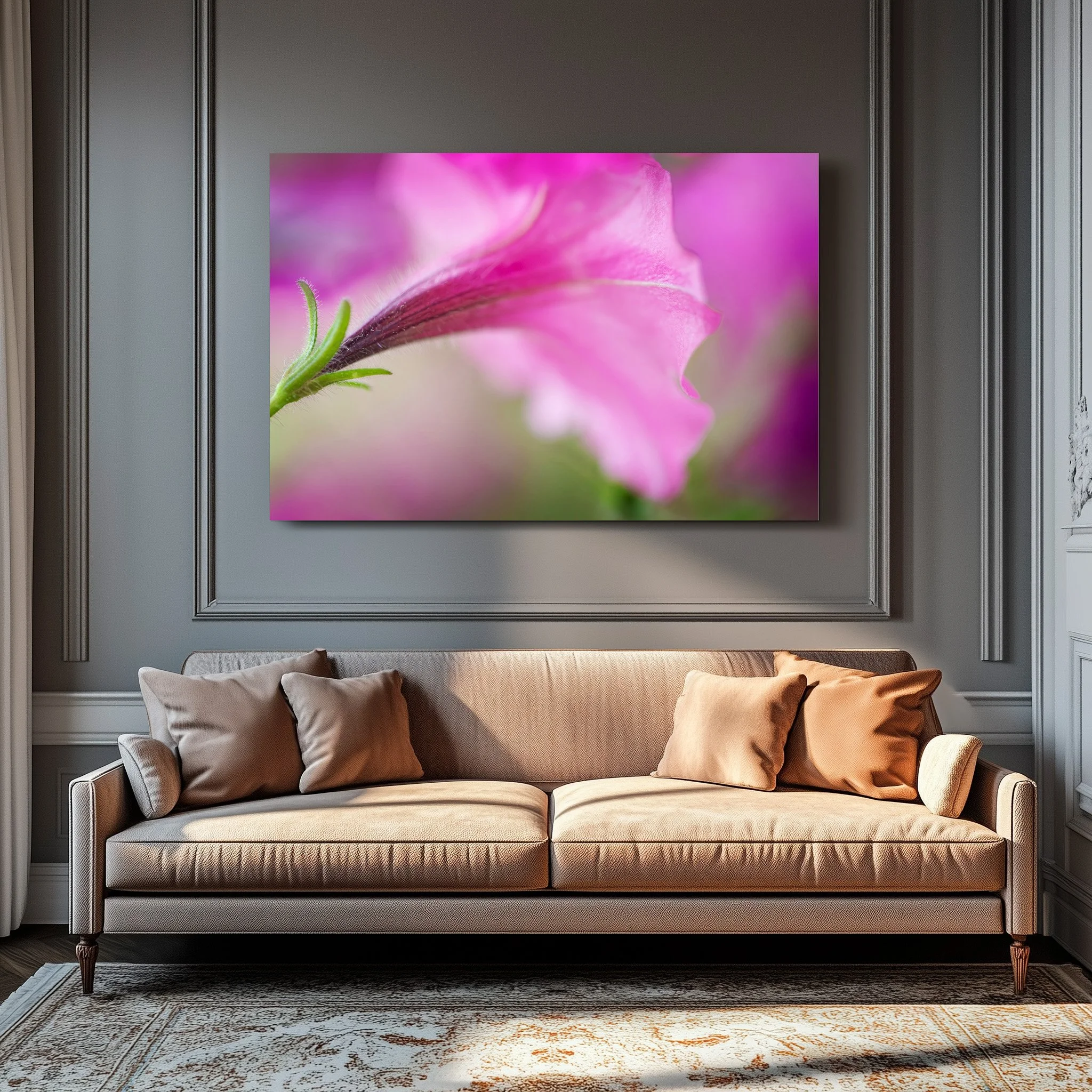 Living room with gray walls, a beige sofa with four pillows, and a large vibrant pink floral artwork on the wall above the sofa.