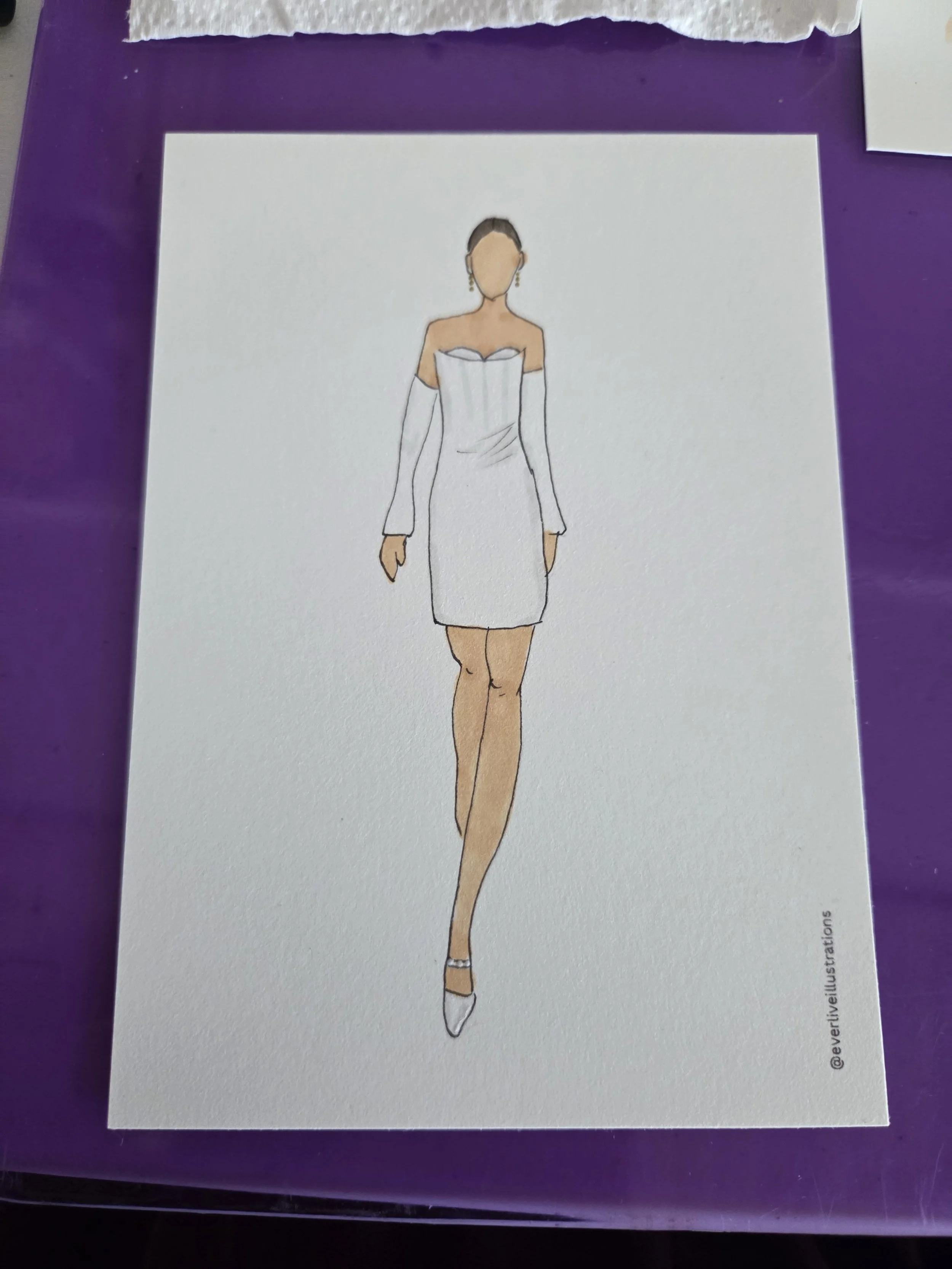 Bride to be at her bridal shower.  Looking fabulous in her short dress with long sleeves