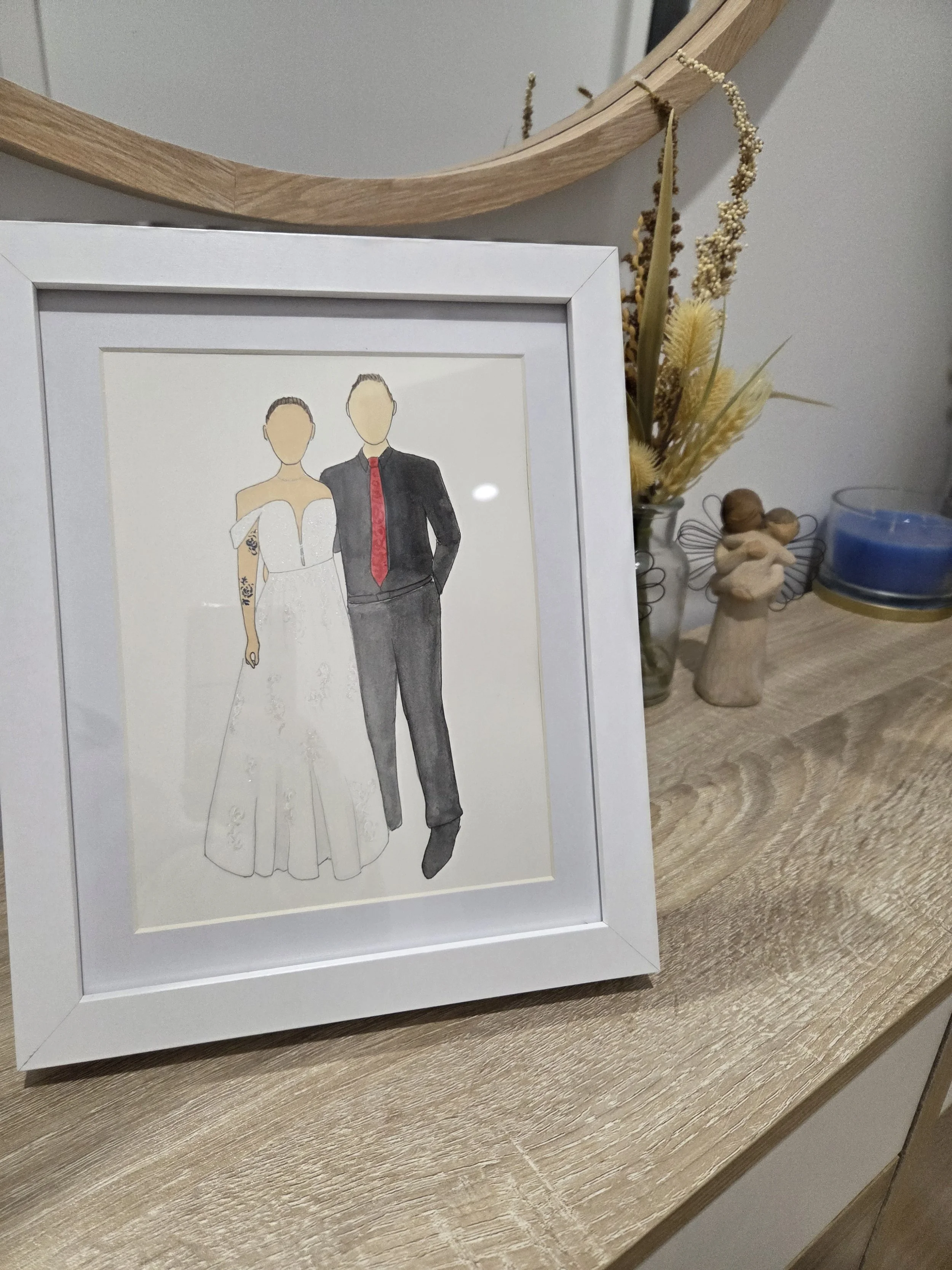 Stunning couple for a surprise wedding.  Bride in beautiful long white dress and groom in black with a striking red tie.
