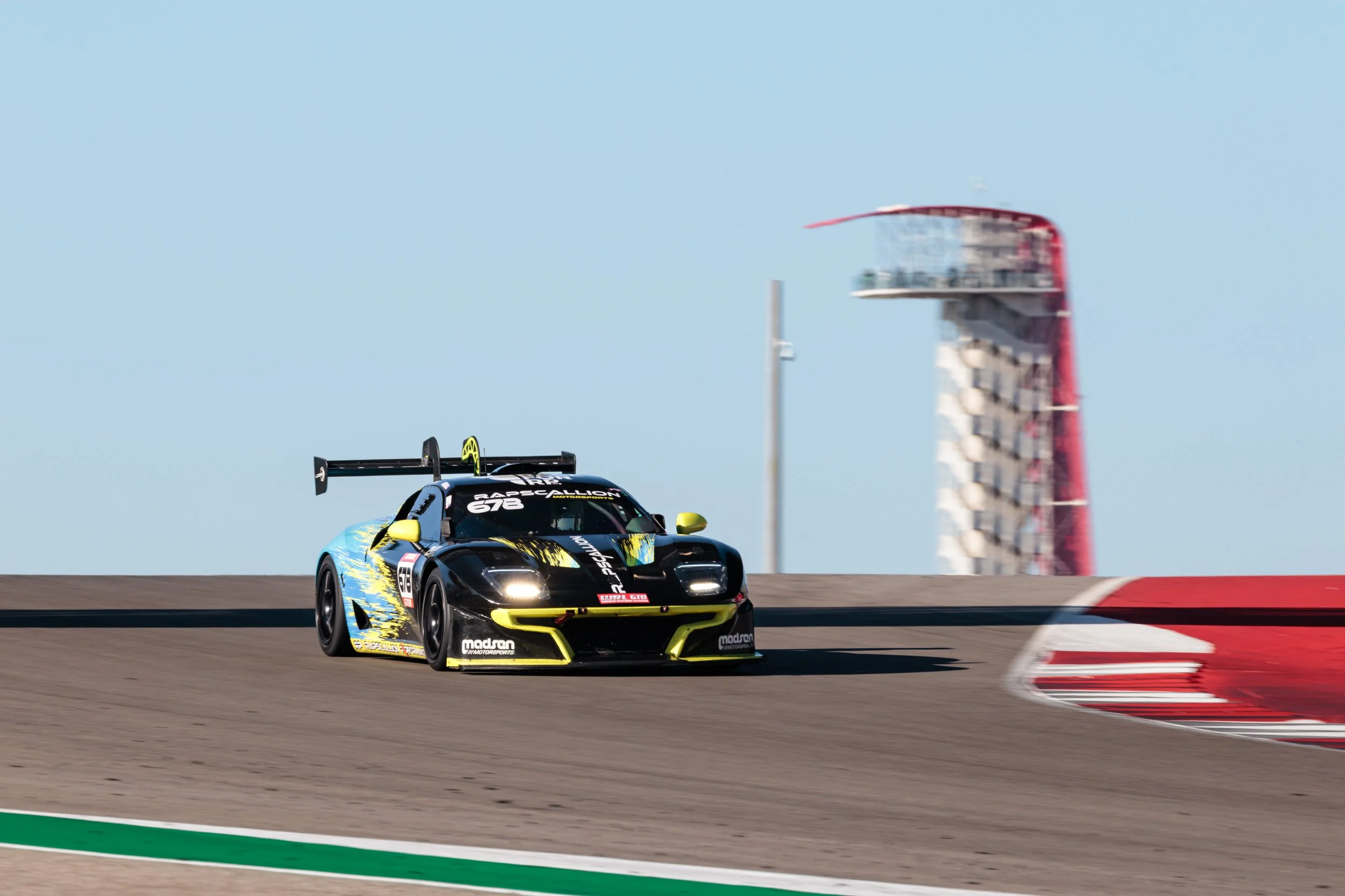 IMSA GT racing team photographed trackside at the Circuit of the Americas during a World Racing League endurance race.