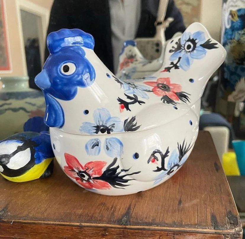 Hen box with blue and red flowers