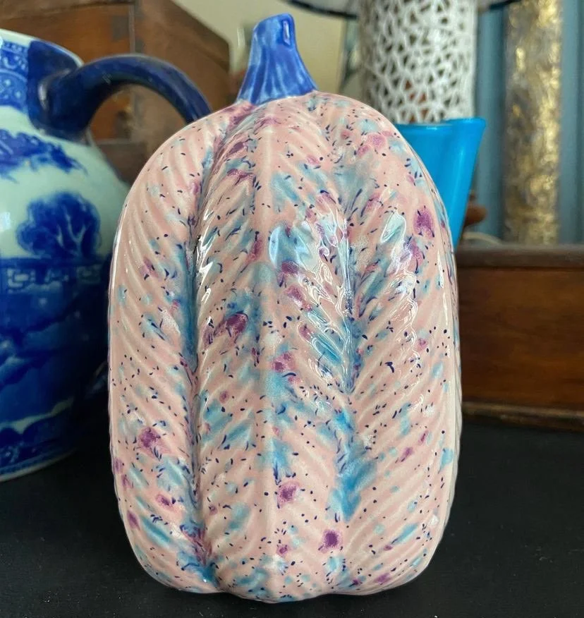 Pumpkin painted using crystal glaze jungle gems. As it's a special glaze, it can go straight in the kiln.