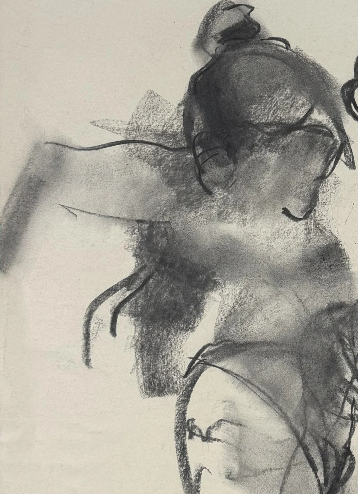 Lost in thoughts by Artist Alla Samarina, closeup of a life drawing of a female figure in motion, using charcoal on paper.