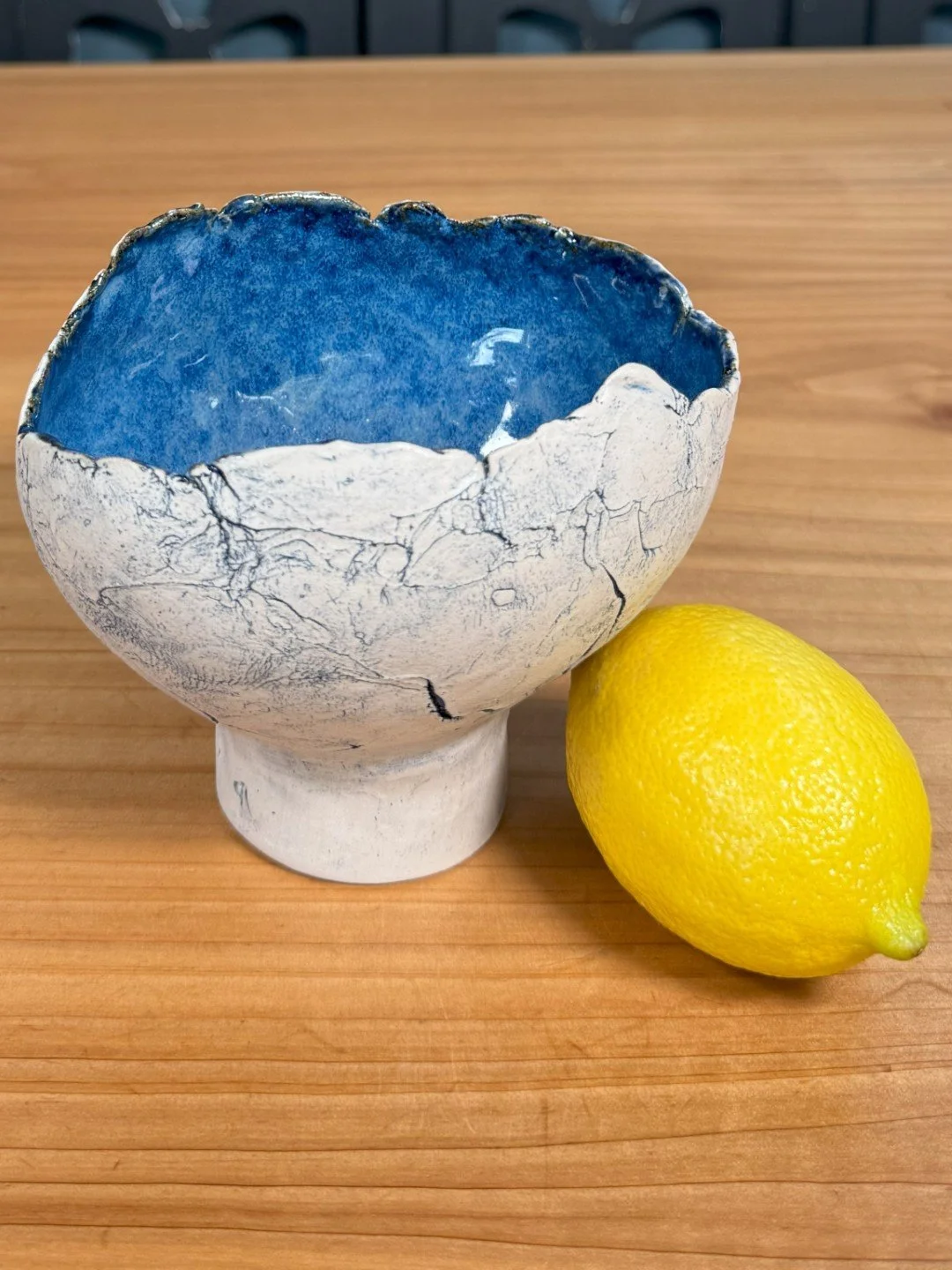 Hand-crafted medium crackle bowls with pedestal by ceramic Artist Nupur Narain DeTar, with beautiful blue pigments.