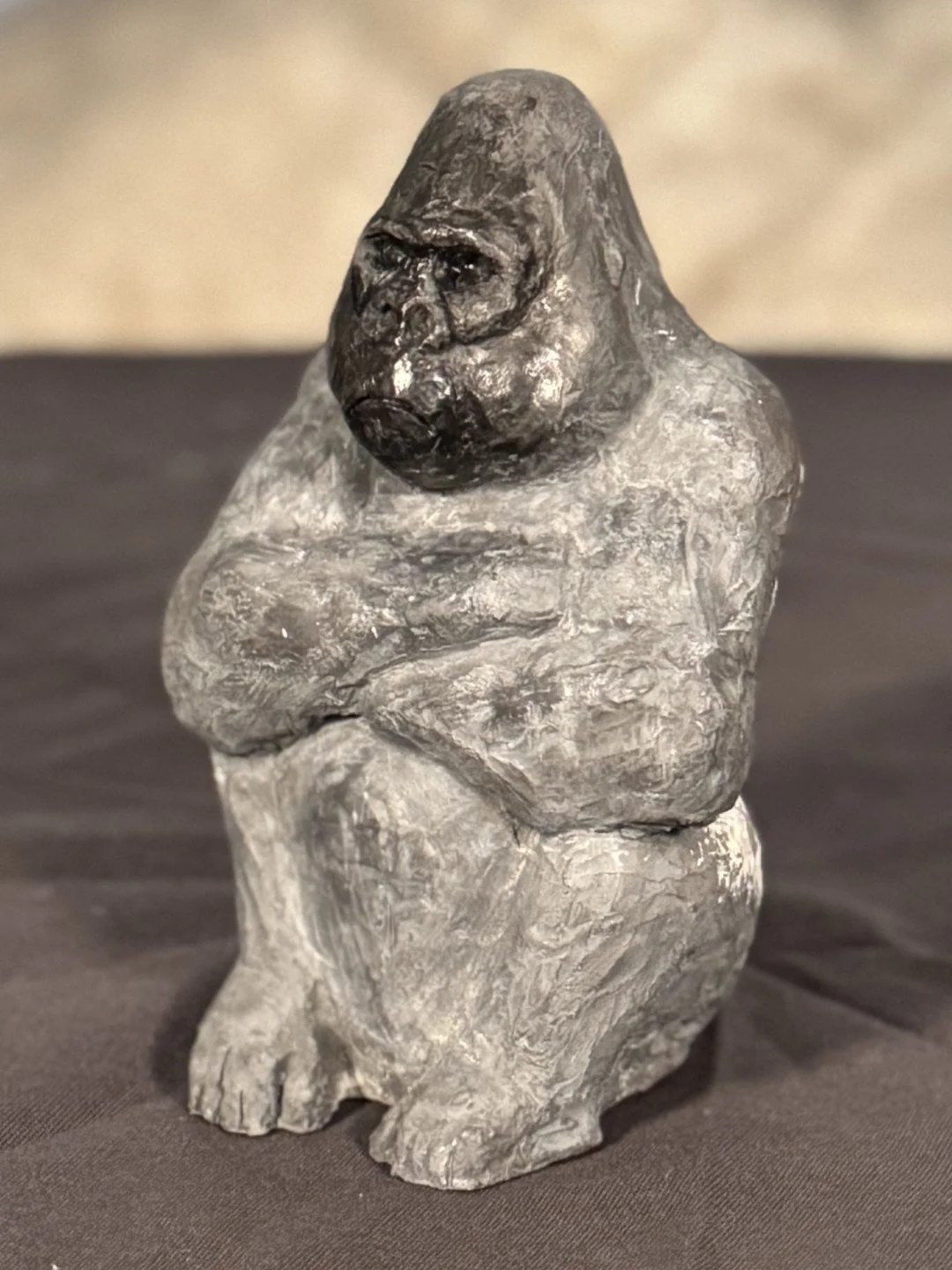 Seated Silverback sculpture by Julien Hipeau, created from a mould and cast in Jesmonite, a sustainable resin chosen for its durability and fine detail.