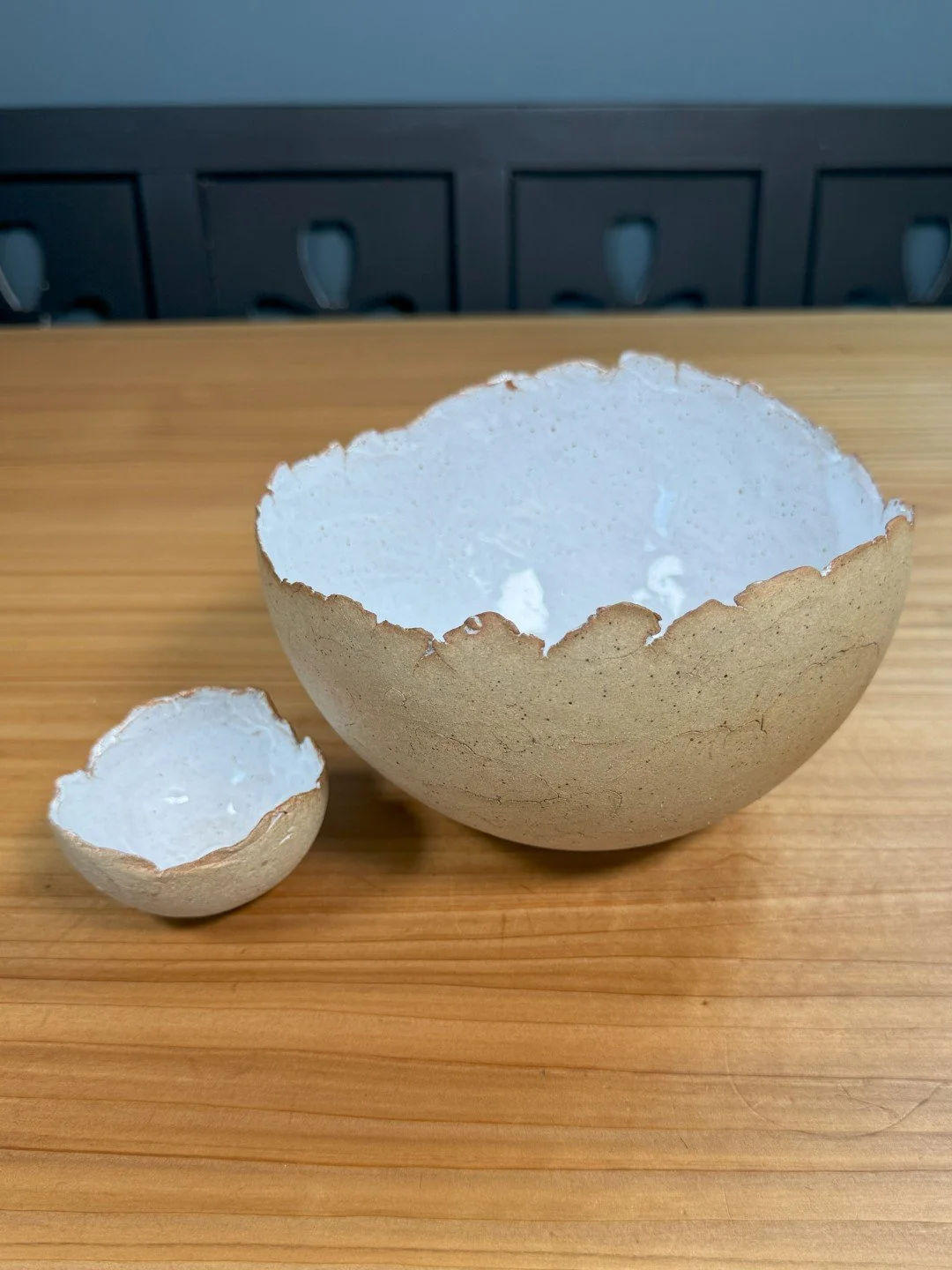 Beautiful hand-built crackle bowl by ceramic Artist Nupur Narain DeTar, displayed with smaller version.