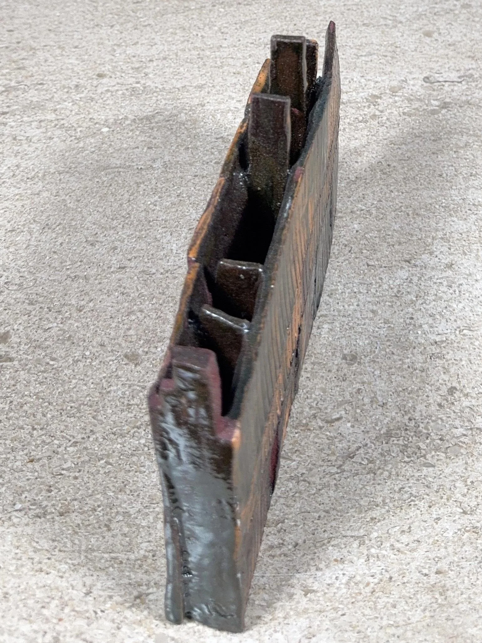 Skyline 1 red stoneware sculpture from ceramic Artist Cristina Lorenzet viewed from the top.