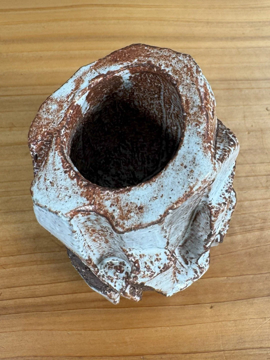 Top view of Kurinuki vase by ceramic Artist Nupur Narain DeTar, hand-carved, glazed and high-fired.