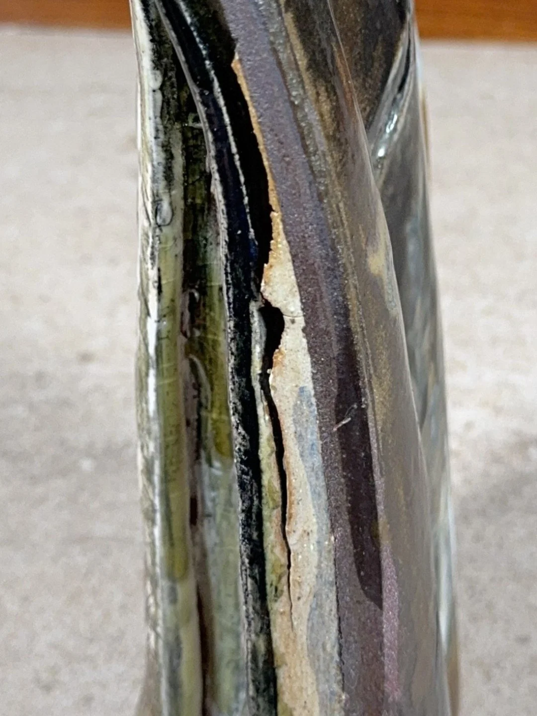 Side close-up of Rooftile by ceramic Artist Cristina Lorenzet, a unique sculpture with stunning texture and natural colours.