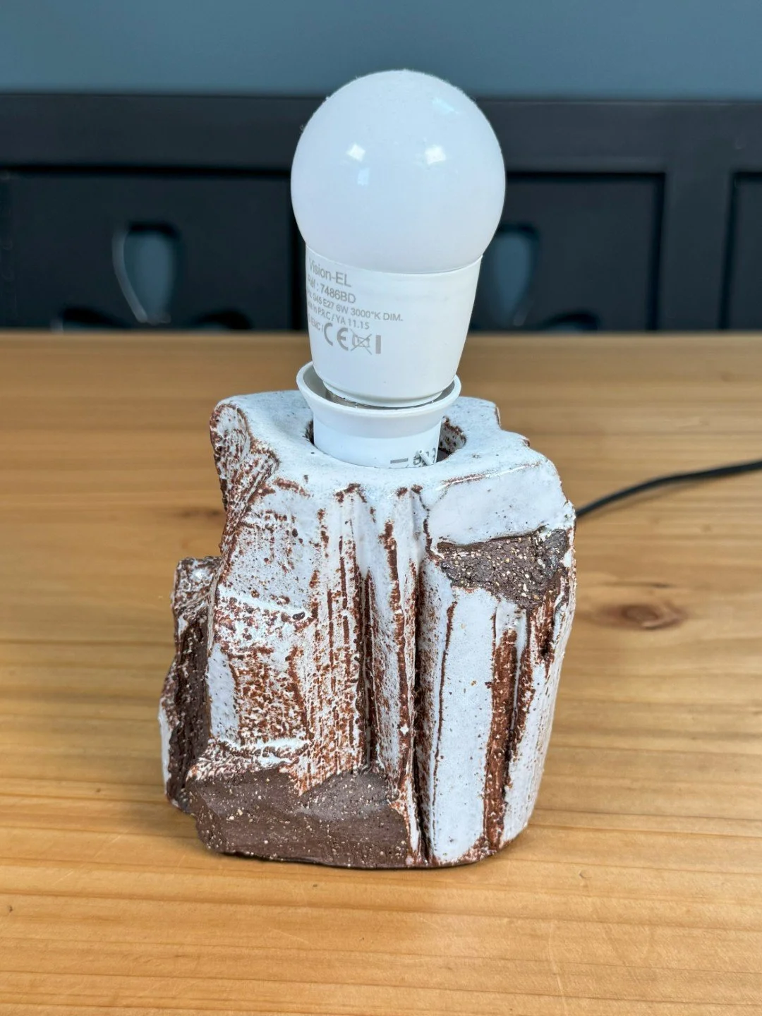 Kurinuki lamp by ceramic Artist Nupur Narain DeTar, hand-carved base, high-fired, with lampshade and wiring kit included.