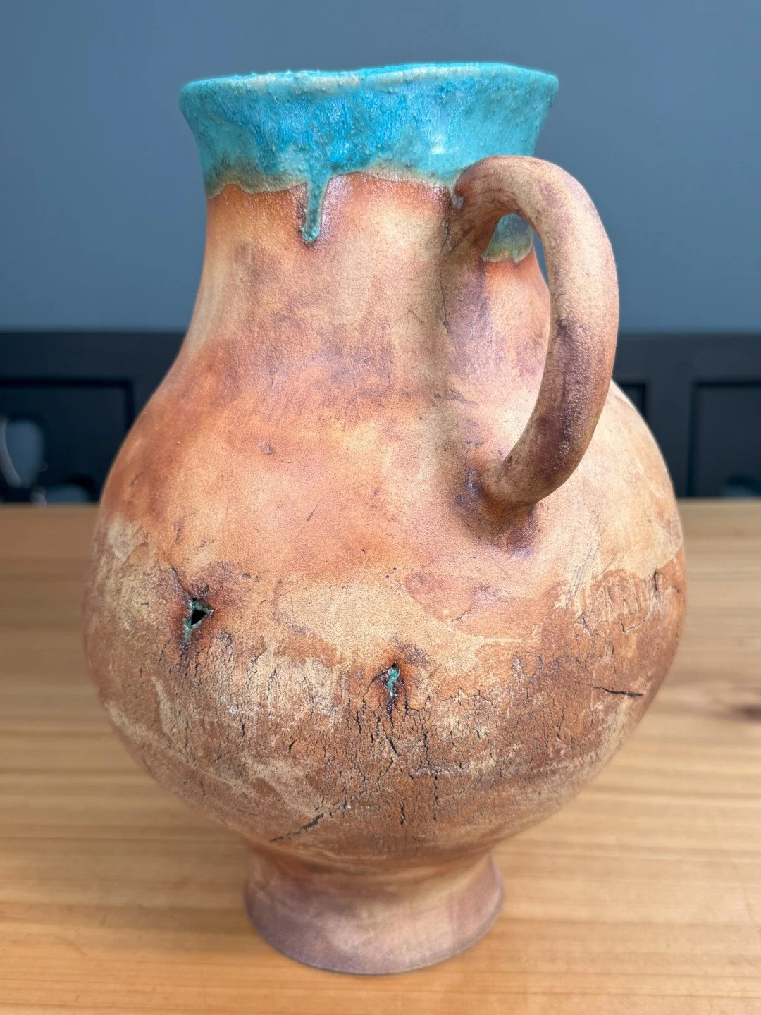 Large ceramic vase by Artist Nupur Narain DeTar, coil-built, with turquoise glaze inside to make it waterproof.