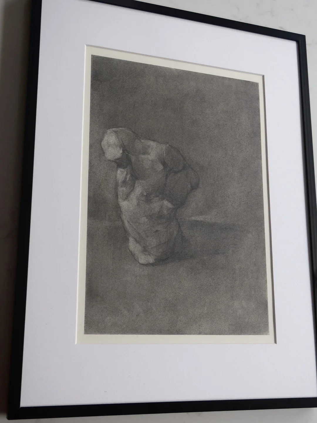 Framed view of Torso cast study (2), an original drawing by Artist Bran Sivas, using graphite and charcoal on paper.