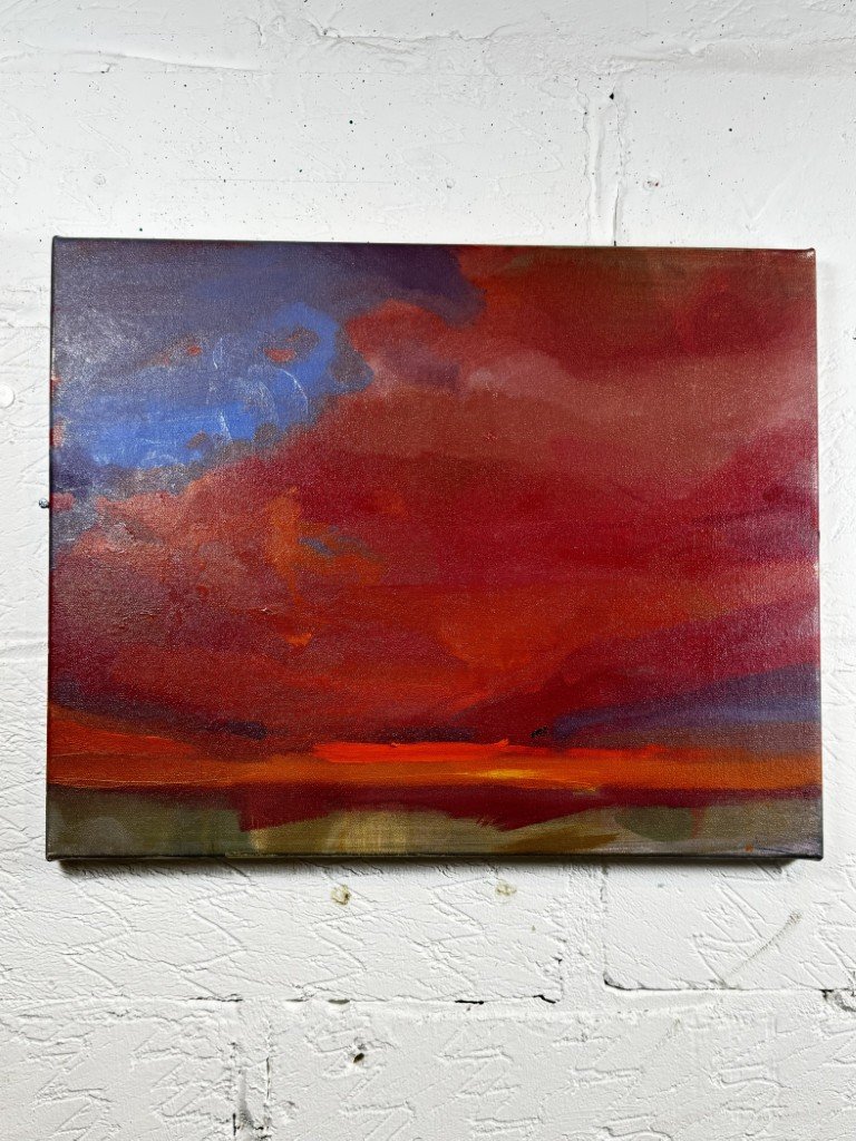 Abstract oil painting capturing a dramatic crimson red and dark purple sunset sky over Cape Town by Larissa Hollis.