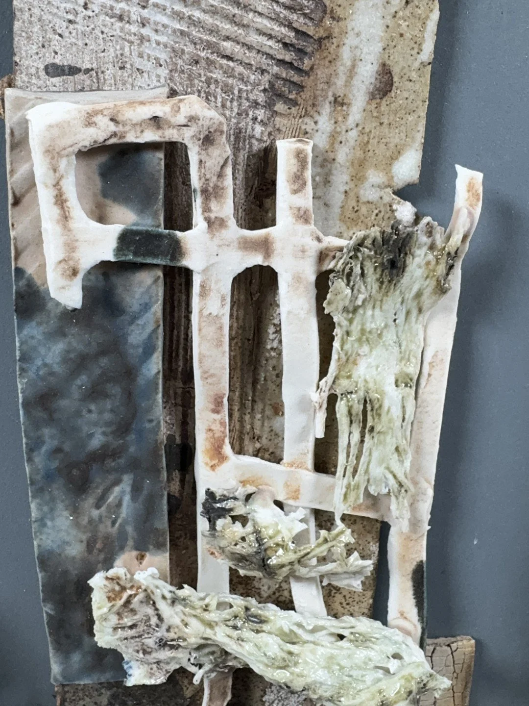Close-up of Collage by ceramic Artist Cristina Lorenzet, textured mix fusing porcelain, white stoneware and grogged clay.
