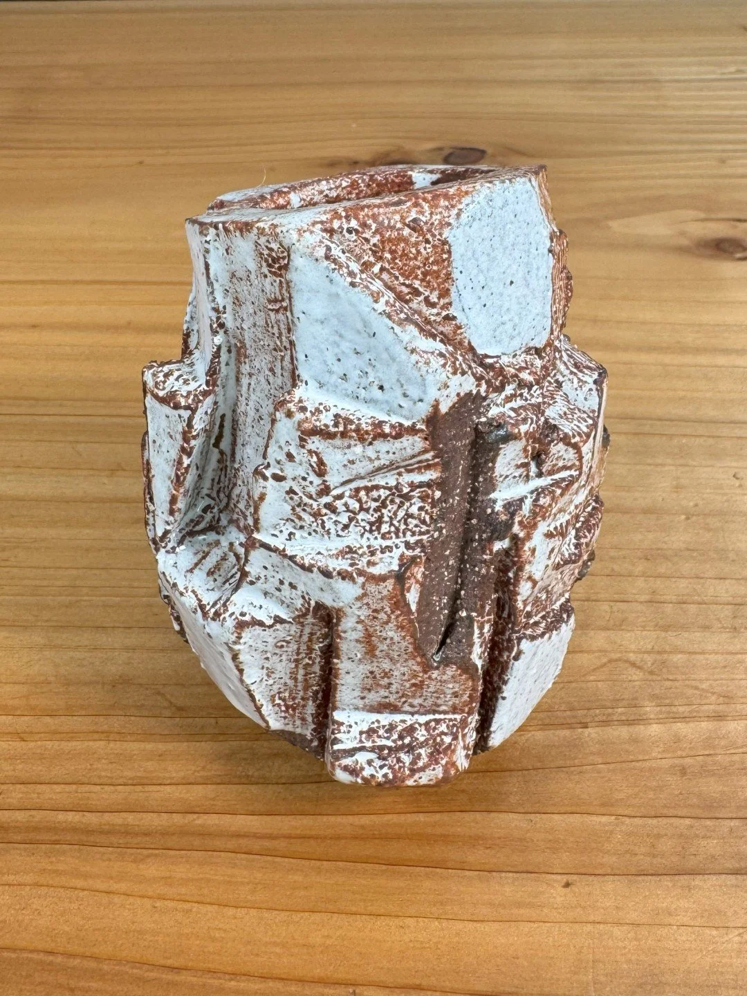 Kurinuki vase by ceramic Artist Nupur Narain DeTar, hand-carved, glazed and high-fired.