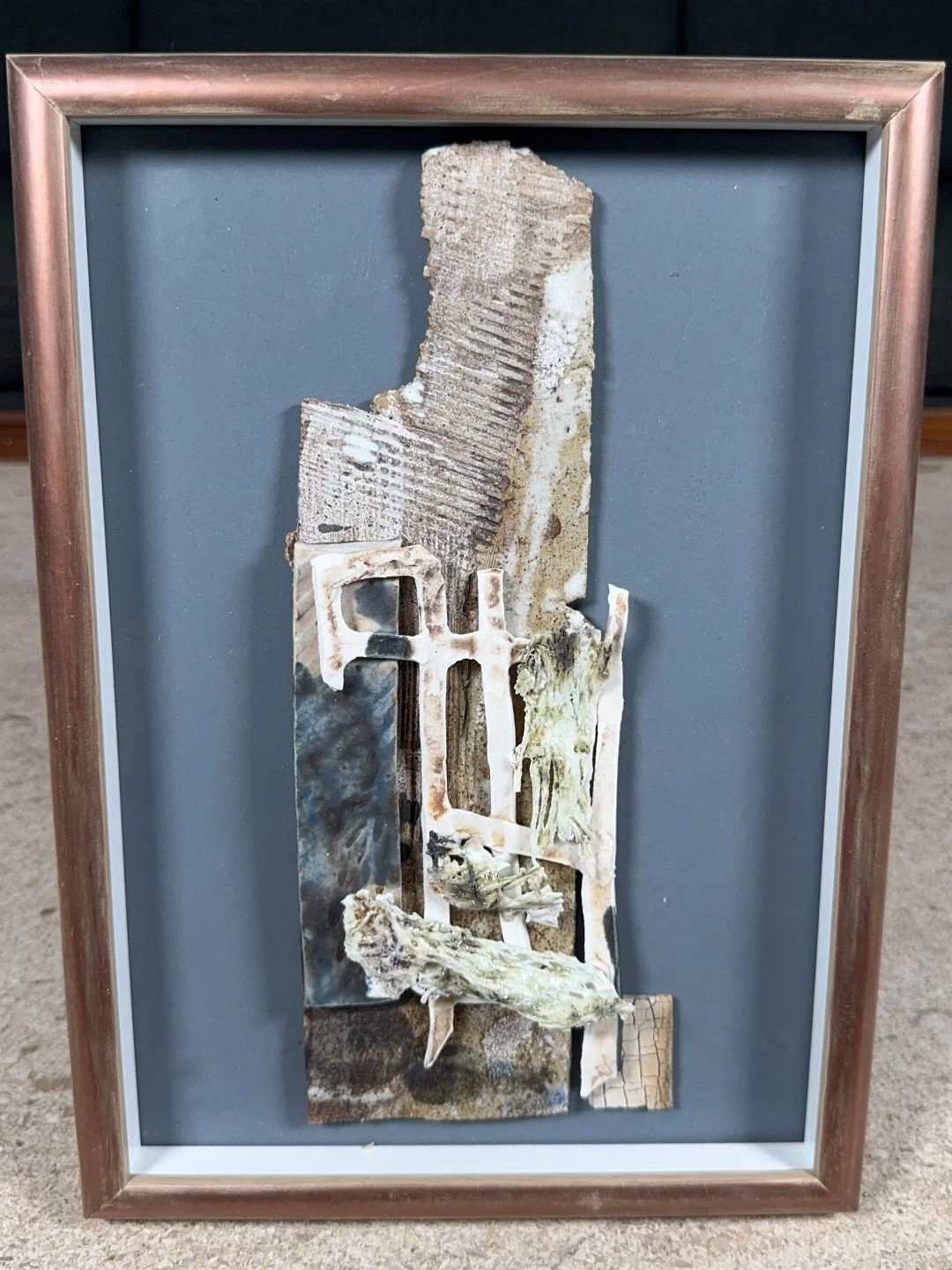 Collage by Cristina Lorenzet, a collage of textures, made by fusing together porcelain, white stoneware and grogged clay.