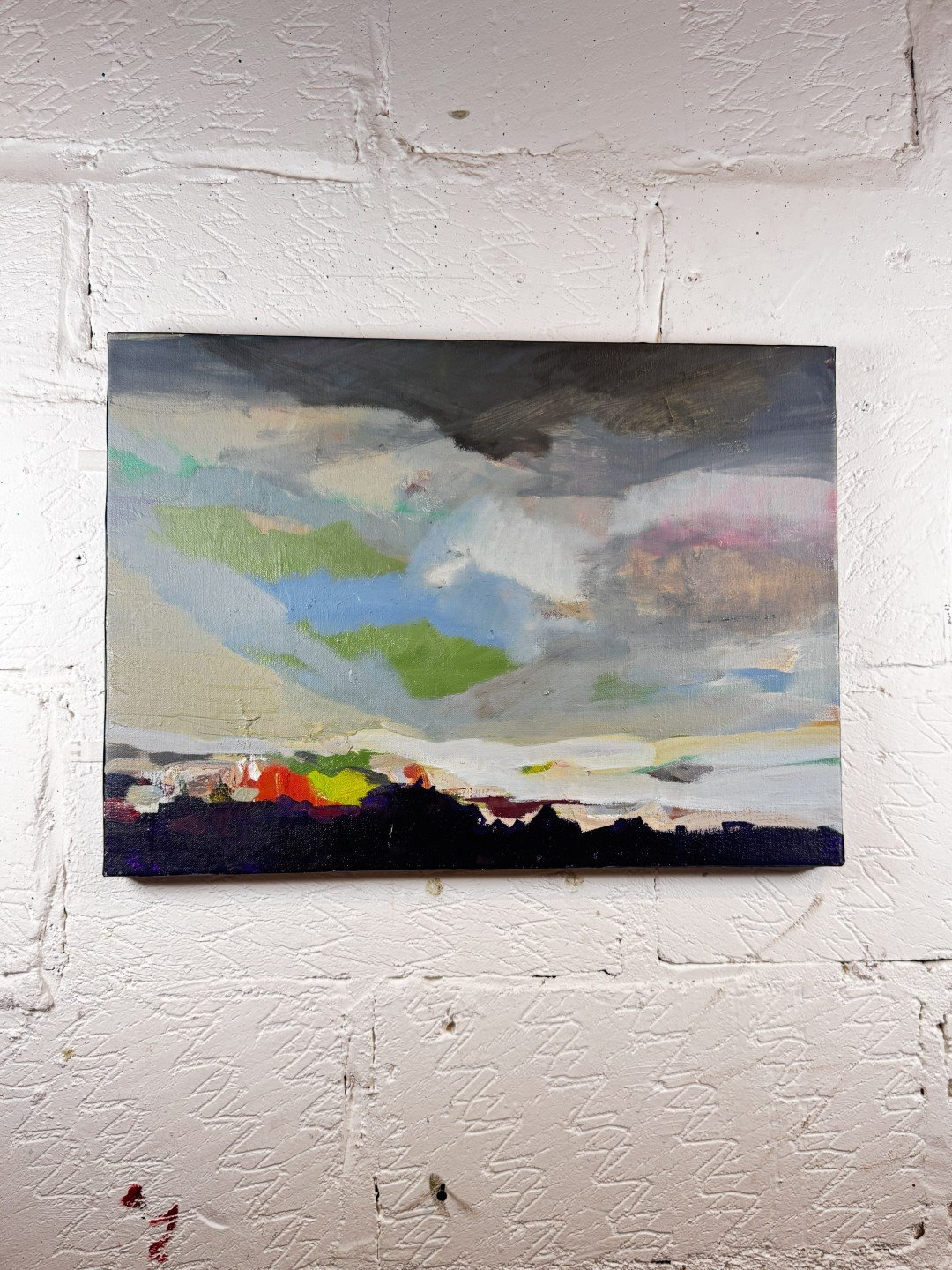 Original oil painting "Bakoven Skies S4" by Larissa Hollis, featuring Cape Town skies and Berg wind, displayed on a wall.