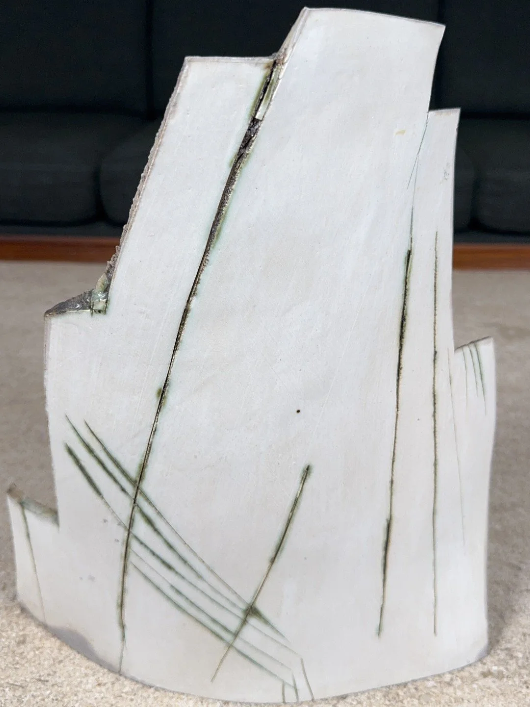 London Façade stoneware sculpture by ceramic Cristina Lorenzet decorated with copper oxide, satin transparent glaze.