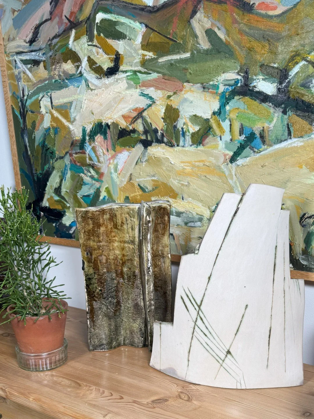 Rooftile by ceramic Artist Cristina Lorenzet, a unique handmade stoneware sculpture displayed with other artwork.