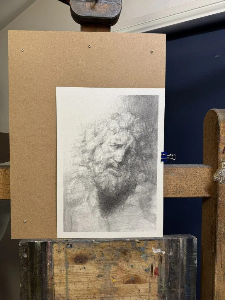 Laocoon Sculpture Study, an original drawing by Artist Bran Sivas, using graphite and charcoal, displayed on an easel.