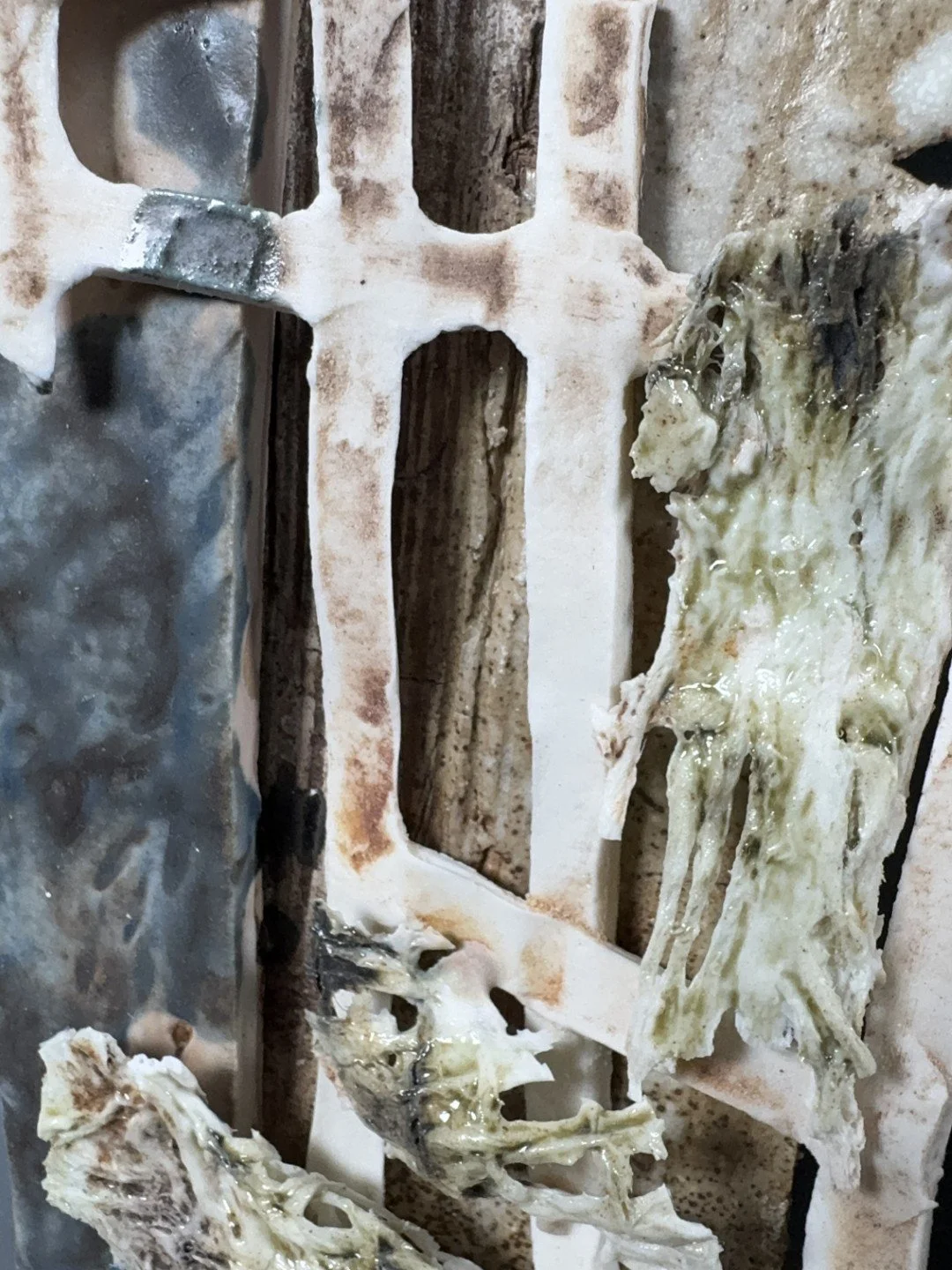 Collage by ceramic Artist Cristina Lorenzet, close-up view of porcelain, white stoneware and grogged clay texture.