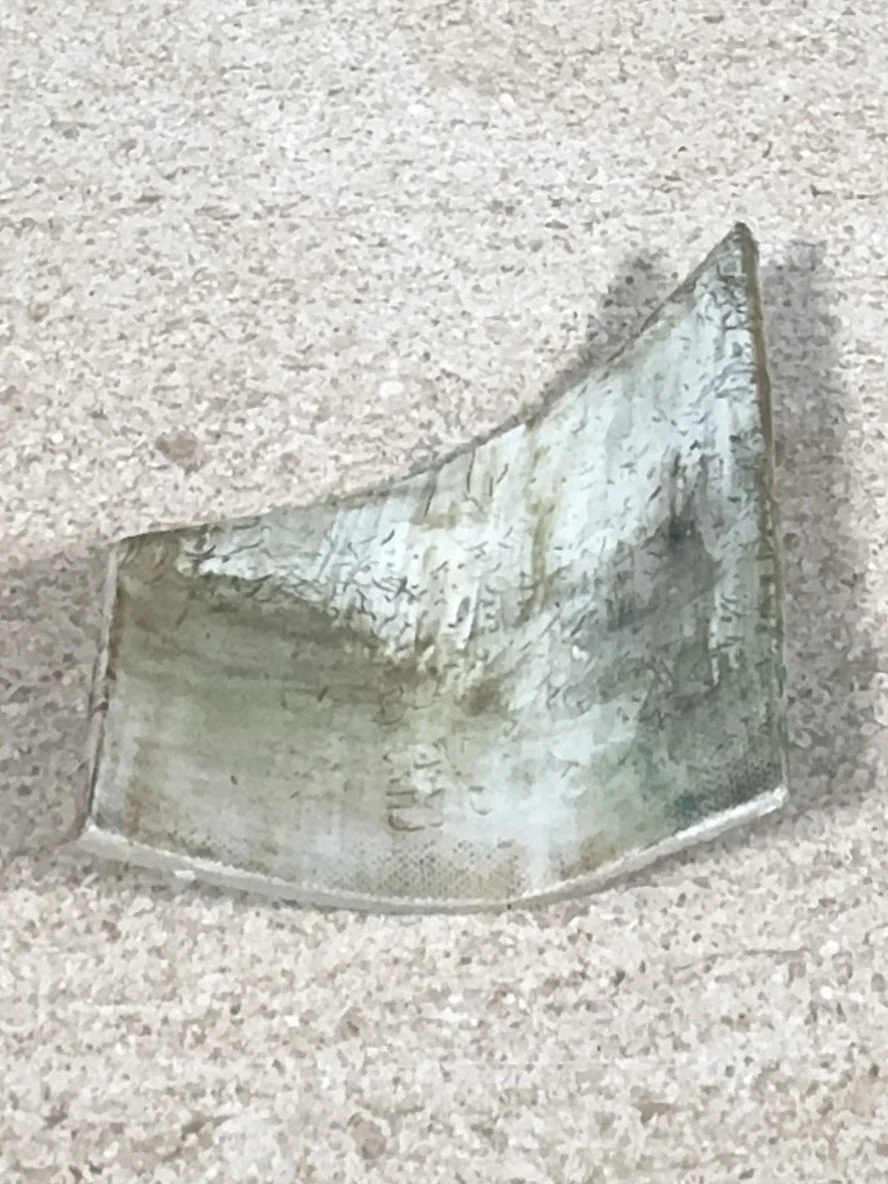 Back view of Fragment by ceramic Artist Cristina Lorenzet, a small stoneware sculpture with beautiful natural colours.