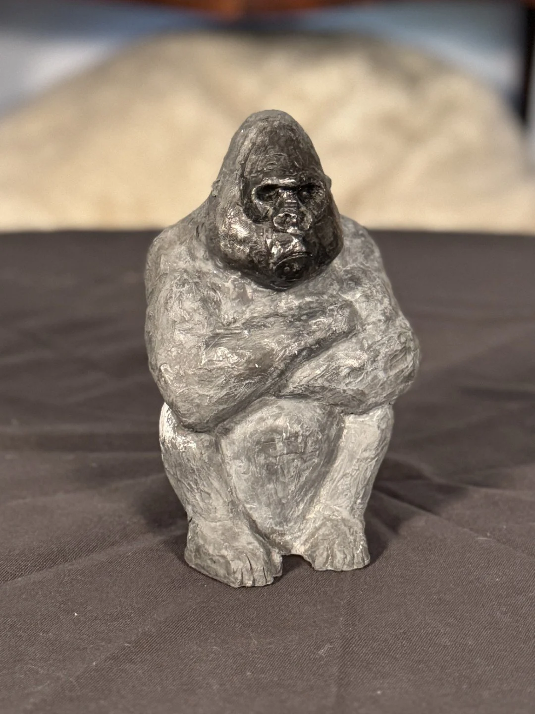 Seated Silverback by Julien Hipeau, a sulpture created from a mould and then cast in Jesmonite, a sustainable resin chosen for its durability and fine detail.