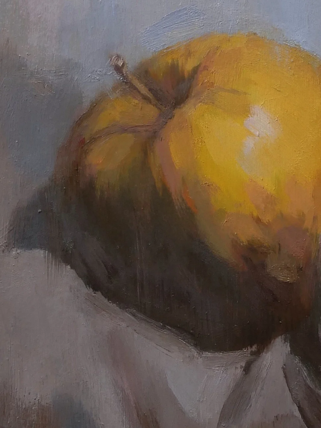 Close-up of Apple On A Napkin, an original oil painting by Artist Bran Sivas, a small artwork painted on cradled board.