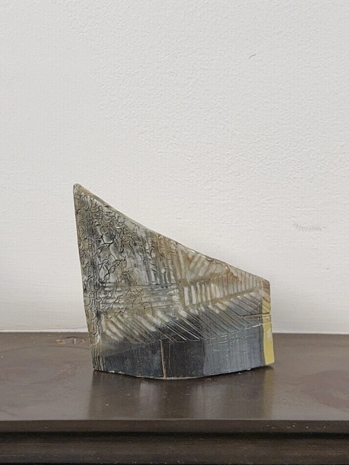Fragment by ceramic Artist Cristina Lorenzet is small stoneware sculpture decorated with porcelain slip and a matt glaze.