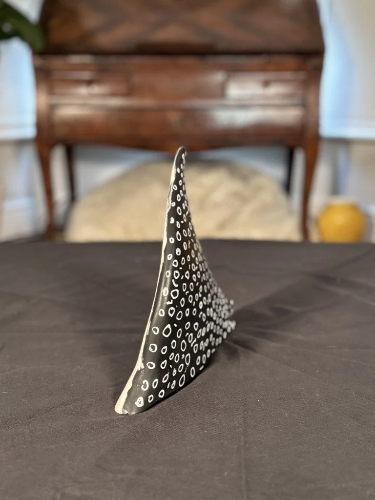 Side view of Half Wing Eagle Ray, a sculpture by Julien Hipeau, cast in Jesmonite, a sustainable resin chosen for its durability and fine detail.