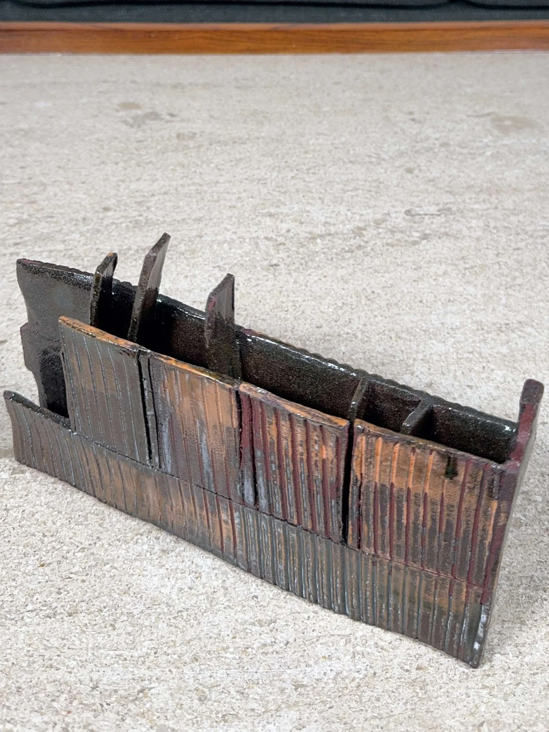 Skyline 1 red stoneware sculpture with orange decorating slip by ceramic Artist Cristina Lorenzet.