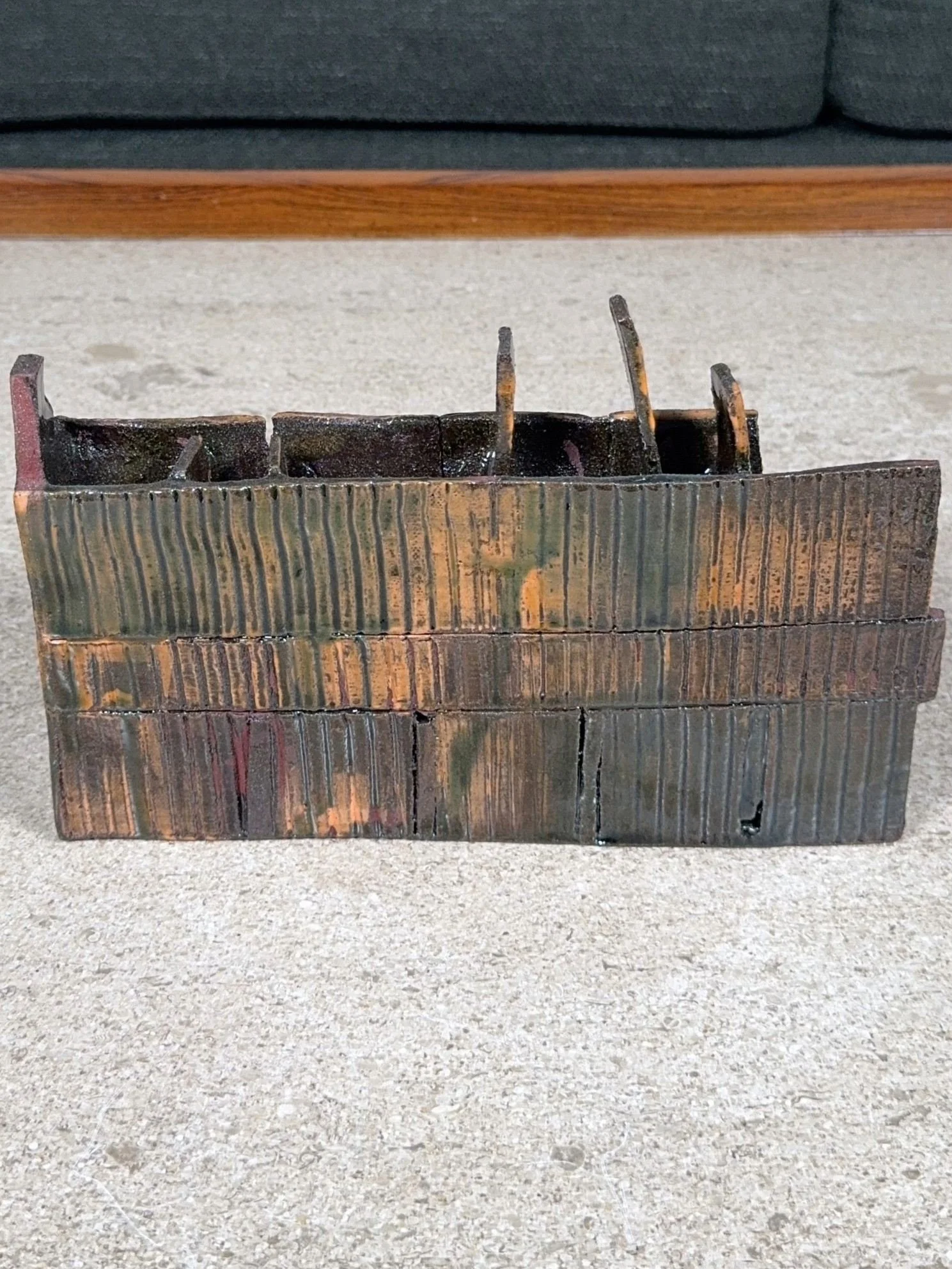 Top view of red stoneware sculpture Skyline 1 by ceramic Artist Cristina Lorenzet.