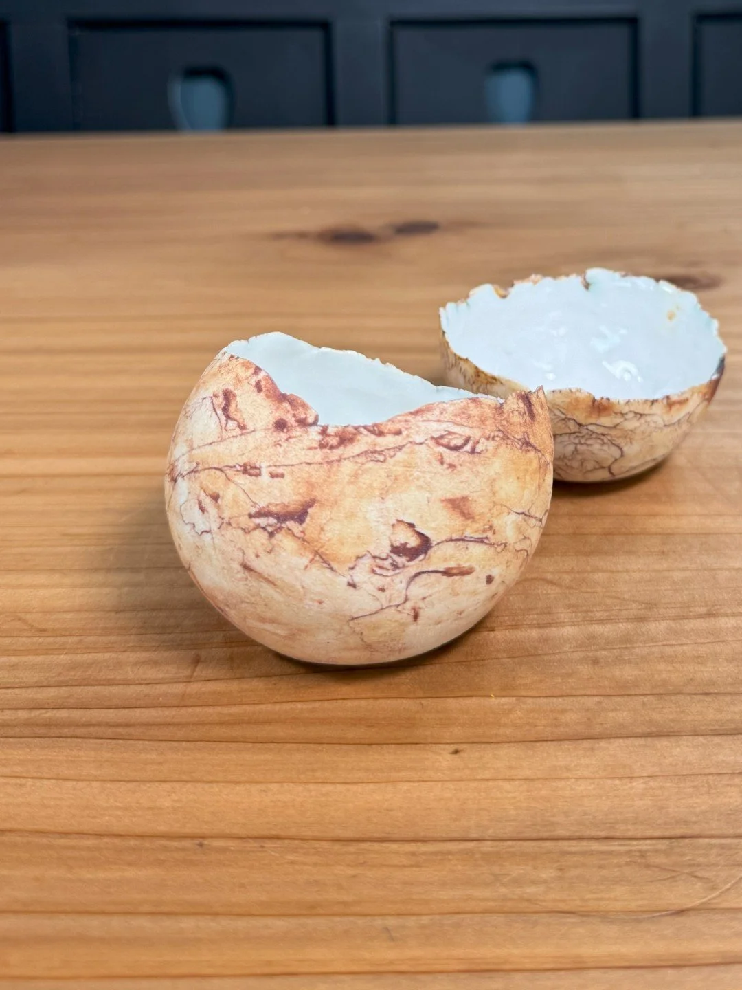 Small eggshell bowl by ceramic Artist Nupur Narain DeTar, food-safe with clear glaze on the inside and iron oxide outside.