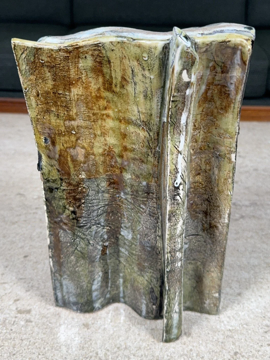 Back view of Rooftile by ceramic Artist Cristina Lorenzet, a unique stoneware sculpture with beautiful shades of green.