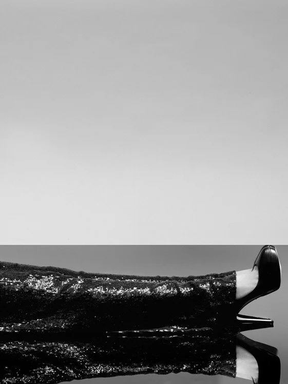 Barbie, a photograph by Carlos Lumiere, right side of the image, a series exploring fragile femininity and sensuality. 2008.