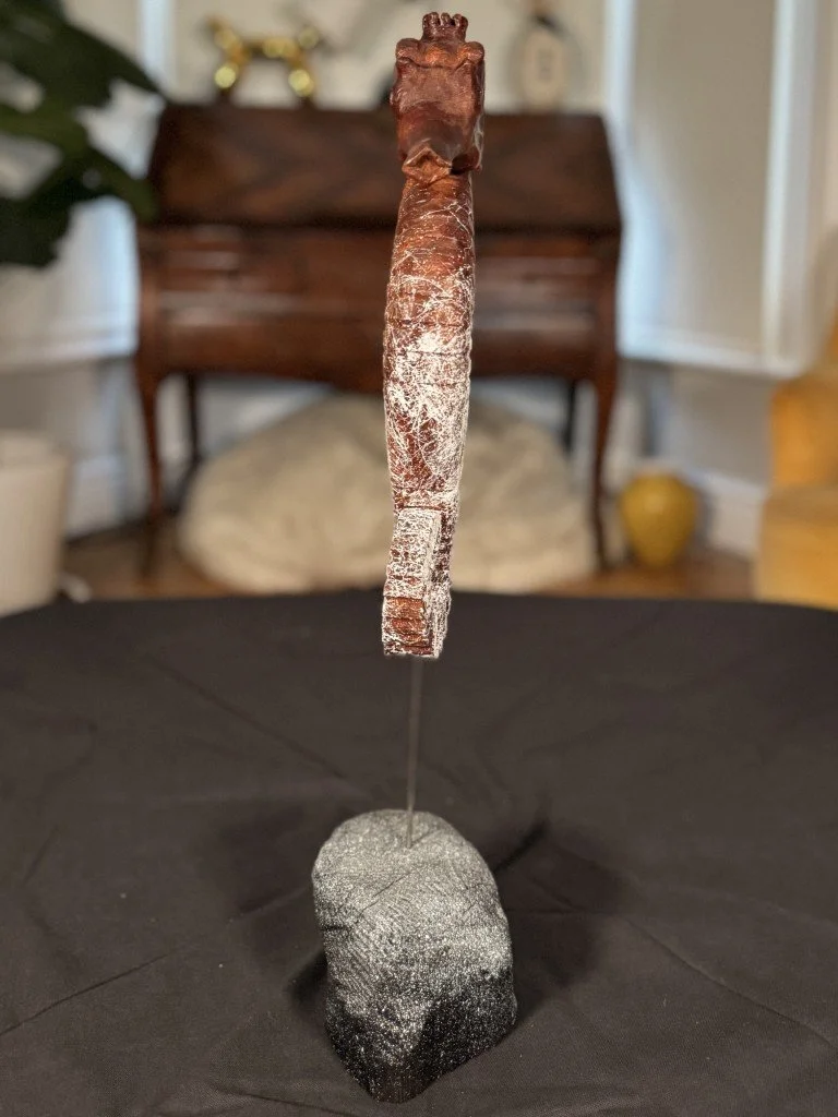 Front view of Skinny Seahorse by Julien Hipeau, a wooden sculpture carved from a reclaimed window sill.