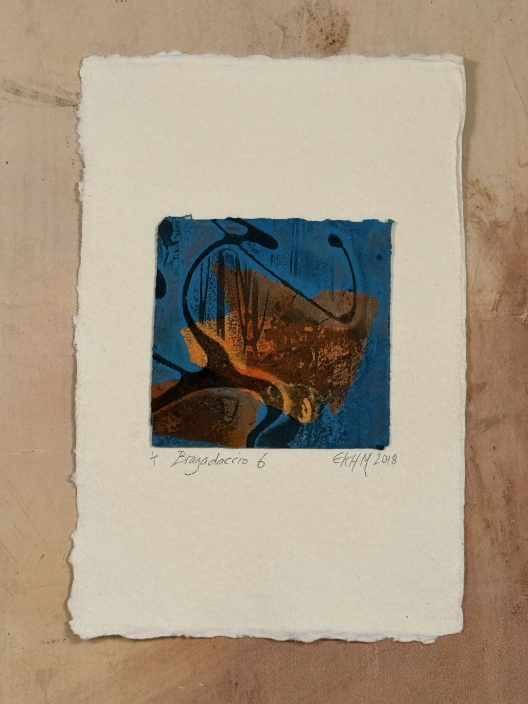 Bragadaccio 6, by Artist Noonie Minogue, an etching and monoprint using chine collé with beautiful blue and orange hues.