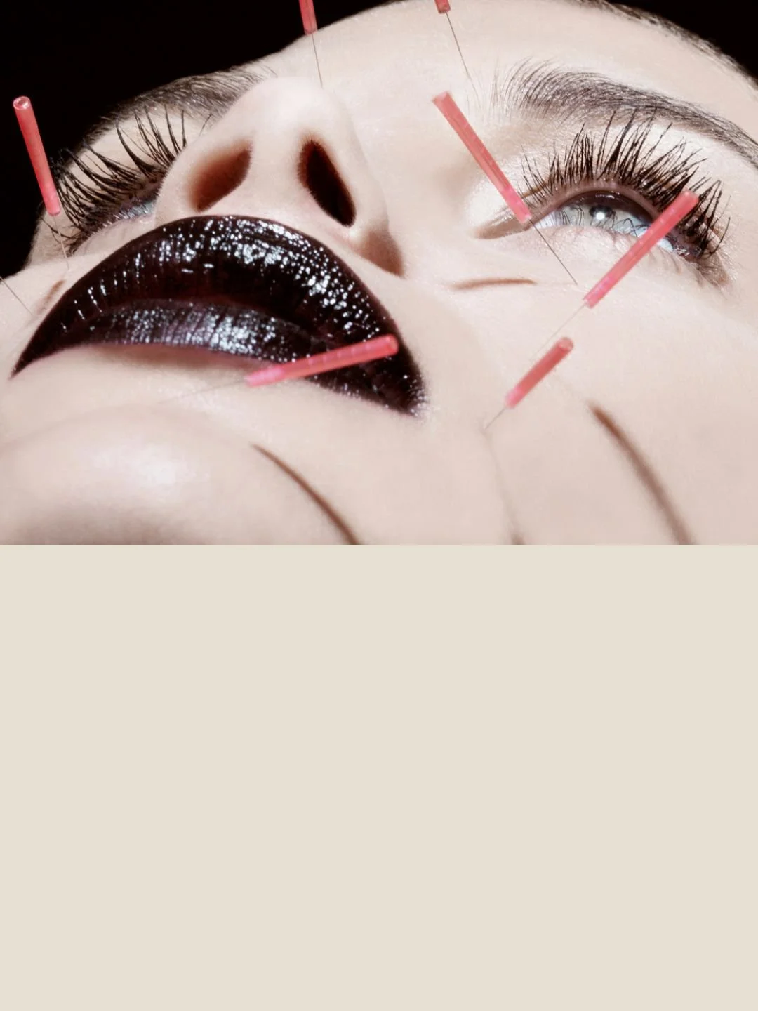 Beauty and pain, a photograph by Carlos Lumiere, a close study of beauty and endurance, strong light, acupuncture needles.