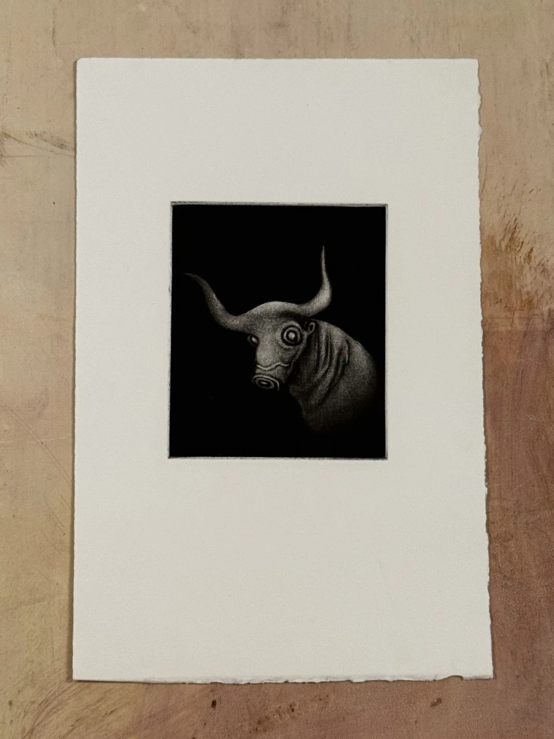 El Toro, mezzotint, by Artist Noonie Minogue, inspired by a Cretan figurine of a bull in the museum at Heraklion.