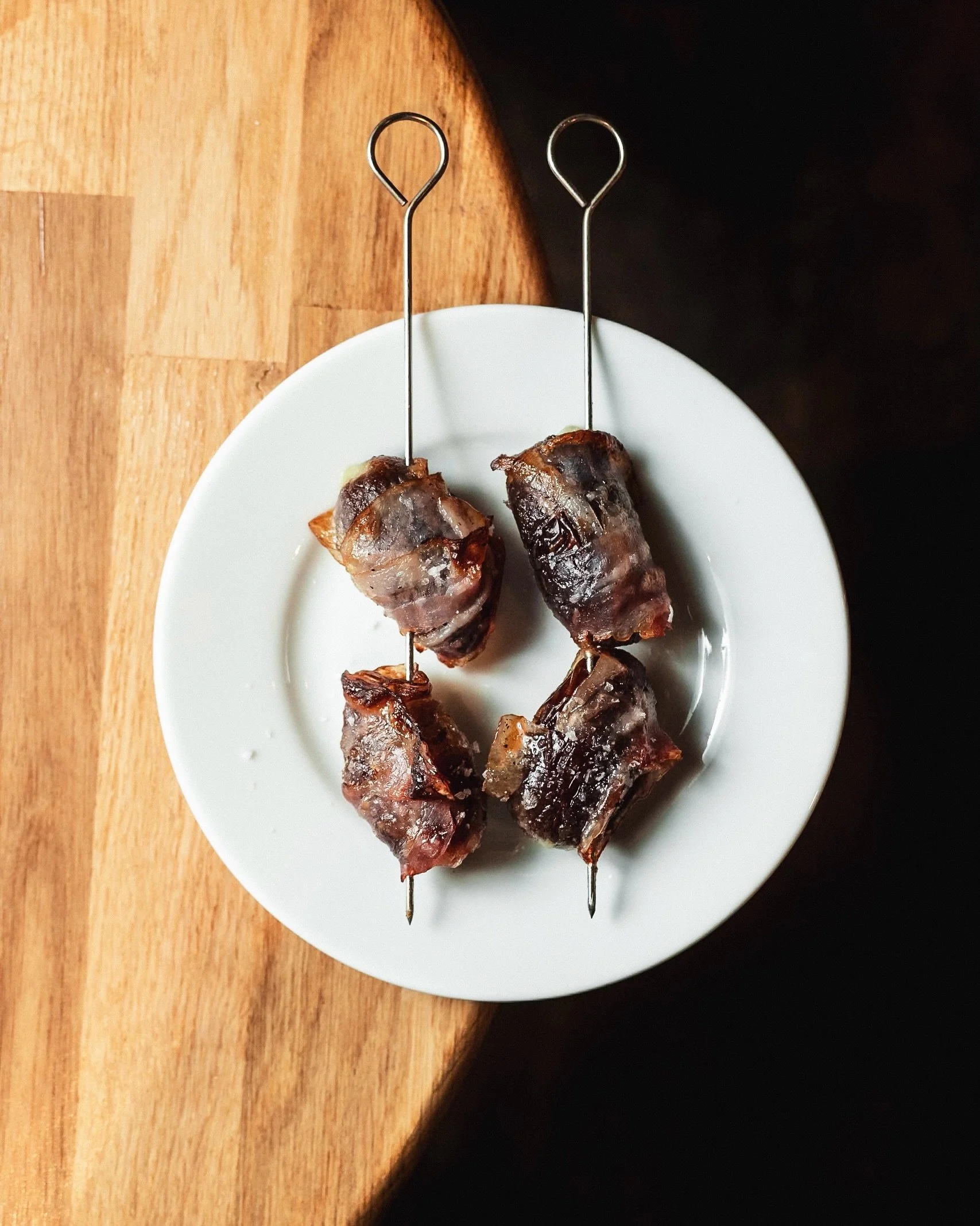Dates

Blue cheese stuffed medjool dates wrapped in Pancetta 
.
Maybe one of the best snacks going