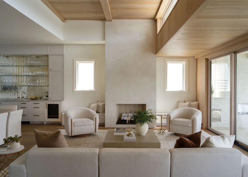 lake-oswego-lakefront-home-living-room-plaster-fireplace.jpg