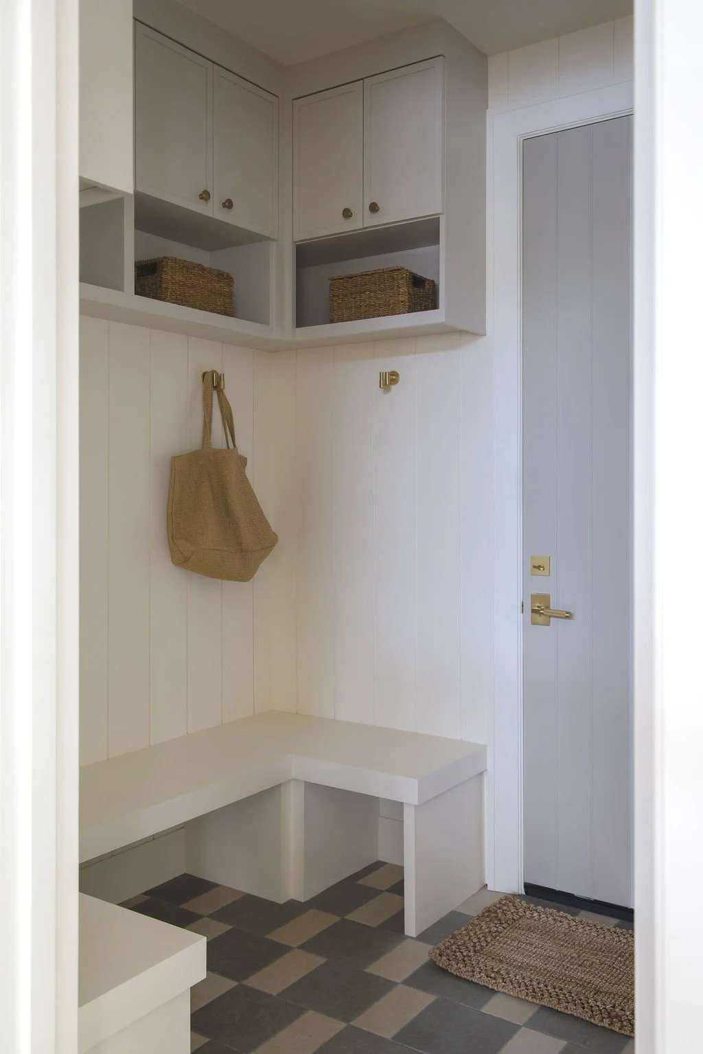 lake-oswego-lakeview-home-mudroom-checkered-floor.jpg