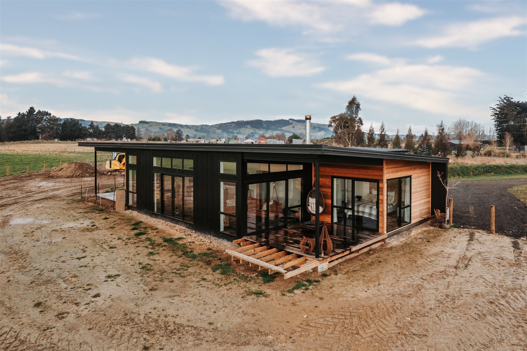 Cedar, Stria and Corten Home in Milton