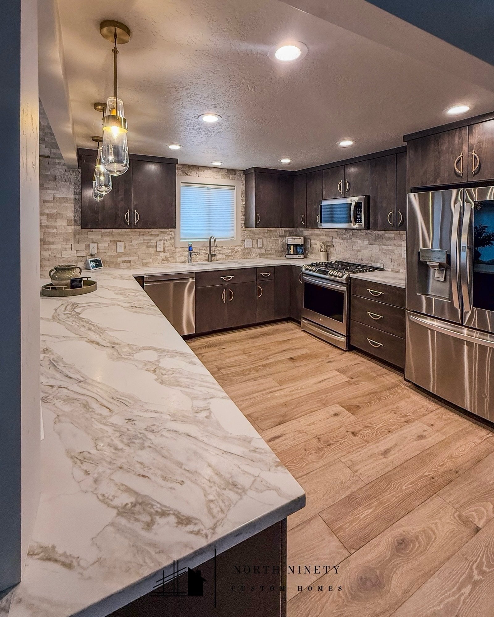 Swipe through to tour this home transformation! 
*
*
Featuring a custom stone fireplace in the living room, beautiful stacked stone accents running through the kitchen and dining room, and a spa-inspired master bathroom crafted for daily luxury.
*
*
