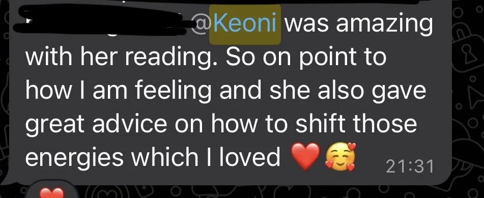 Screenshot of a messaging app conversation with a dark background, showing a message praising someone's reading skills and offering advice on shifting energies, including heart and smiling face emojis.